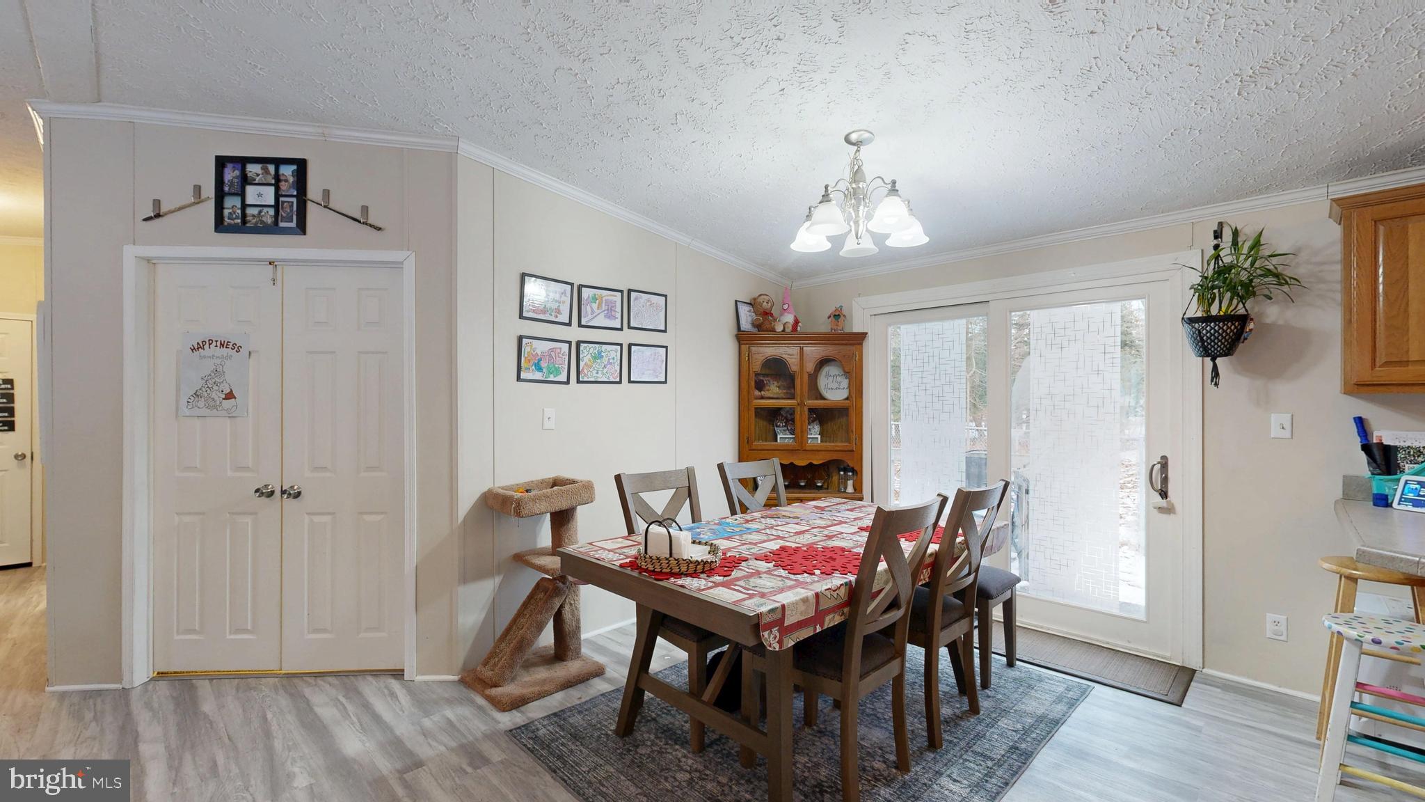 22901 Camp Arrowhead Road Lewes, DE 19958 - Photo 22 of 39 a table and chairs in a room