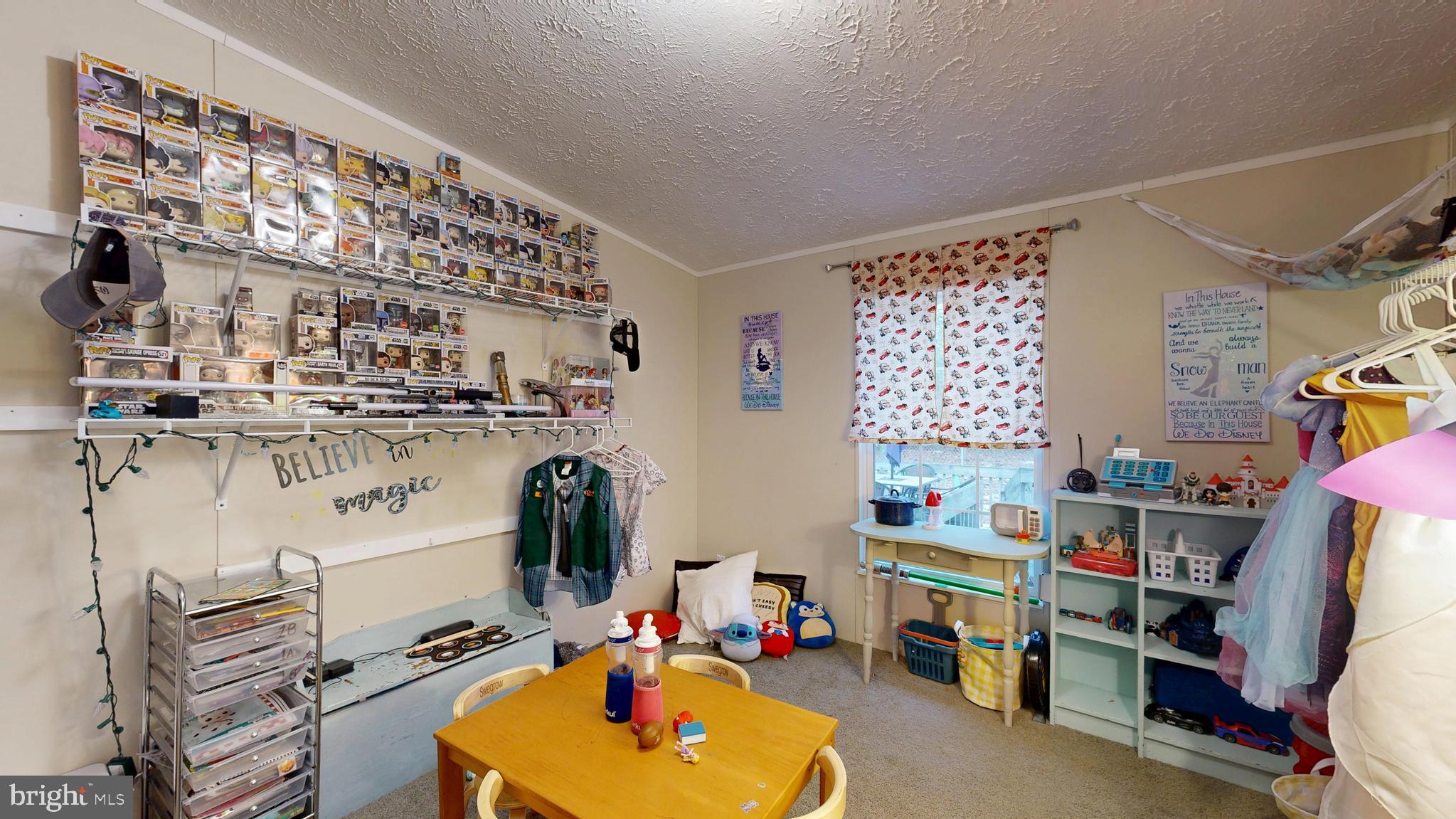 22901 Camp Arrowhead Road Lewes, DE 19958 - Photo 28 of 39 a room with a workspace and a window