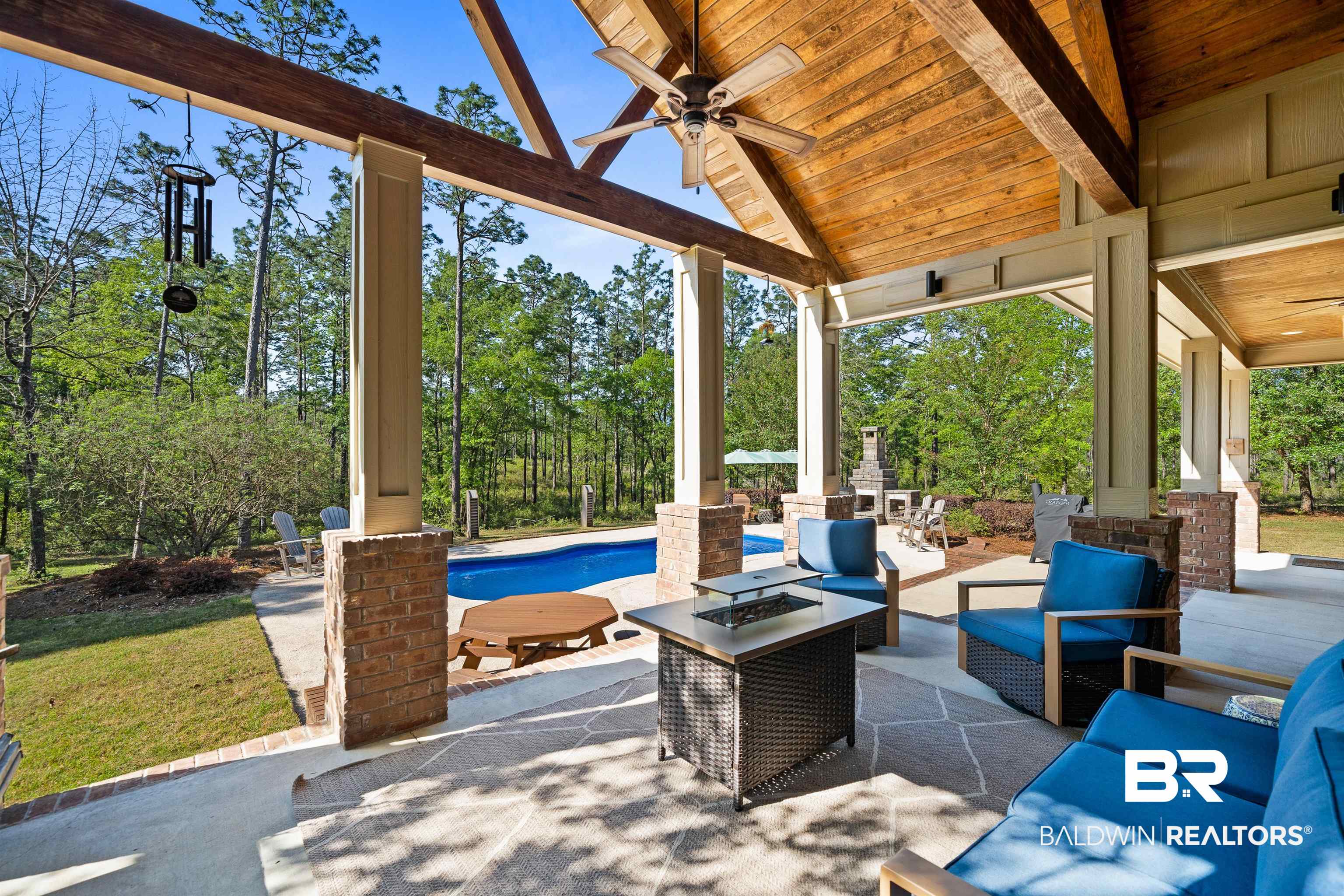 47252 Emmons Road Bay Minette, AL 36507 - Photo 41 of 50 View of patio / terrace featuring a ceiling fan, an outdoor pool, and an outdoor living space with a fire pit