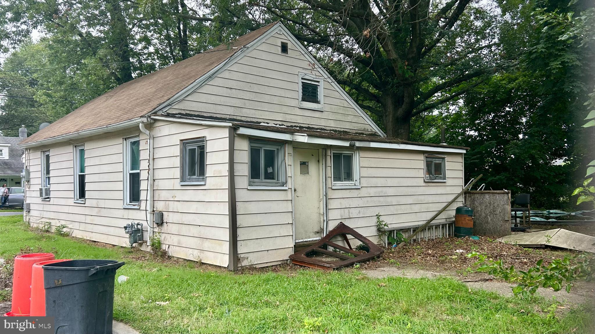 71 Poplar Street Penns Grove, NJ 08069 - Photo 10 of 10 a view of a white house next to a yard and large trees