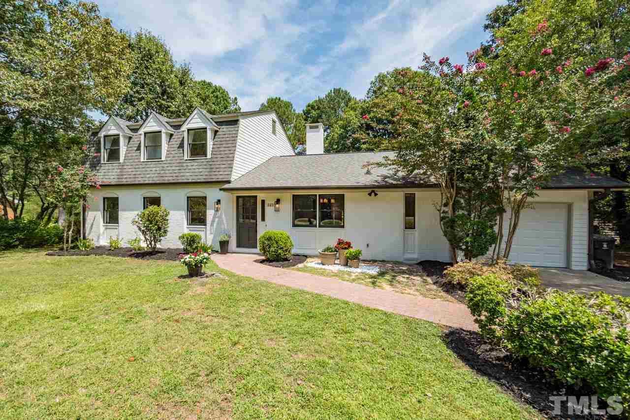 2823 Ridge Road Durham, NC 27705 - Photo 2 of 30 a view of a house with a yard and sitting area