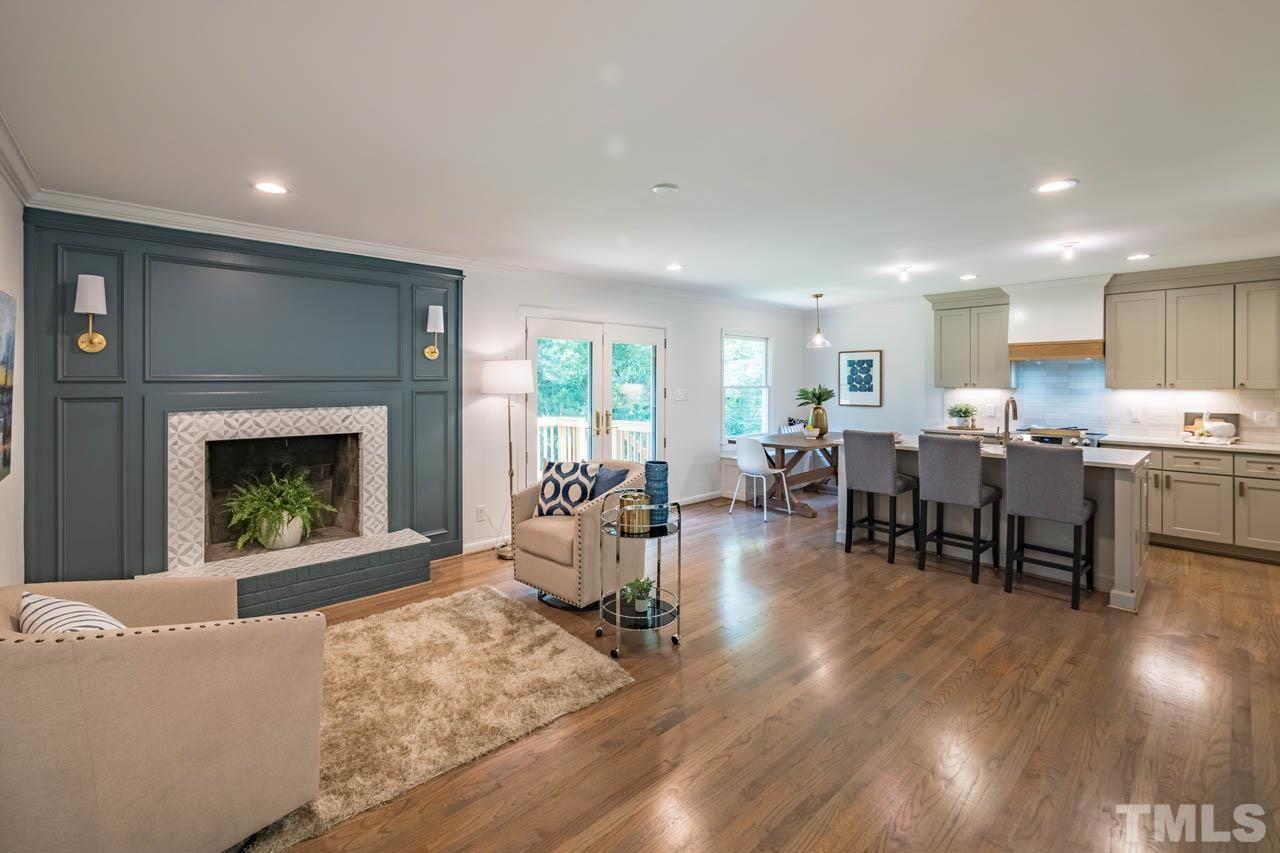 2823 Ridge Road Durham, NC 27705 - Photo 13 of 30 a living room with furniture and a fireplace