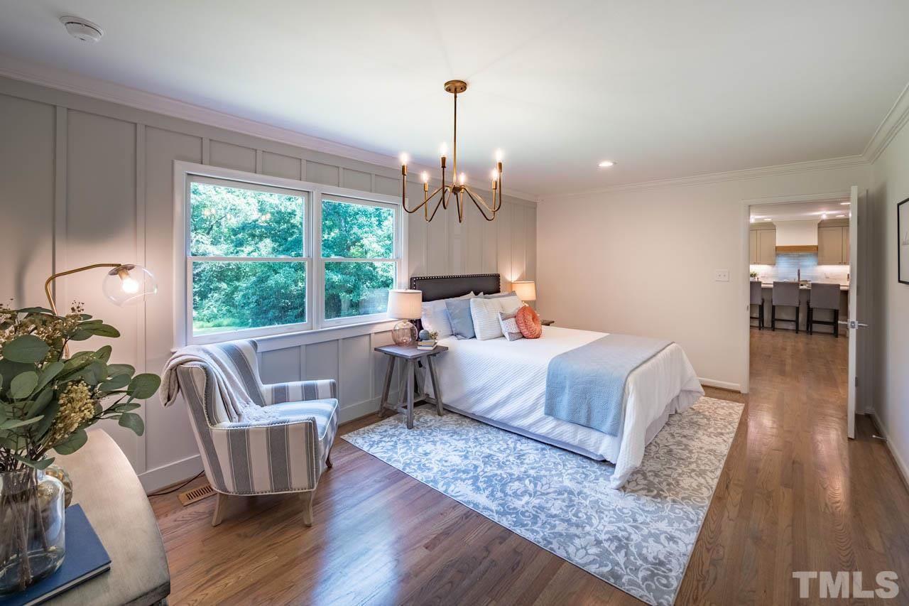2823 Ridge Road Durham, NC 27705 - Photo 15 of 30 a bedroom with wooden floor