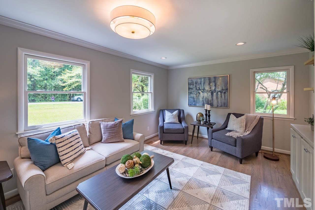 2823 Ridge Road Durham, NC 27705 - Photo 6 of 30 a living room with furniture and a large window
