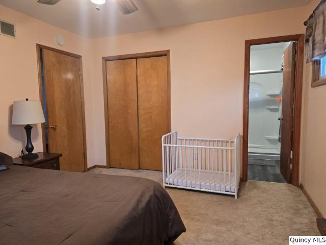 710 Country Lane Carthage, IL 62321 - Photo 16 of 31 a bedroom with a bed and a lamp