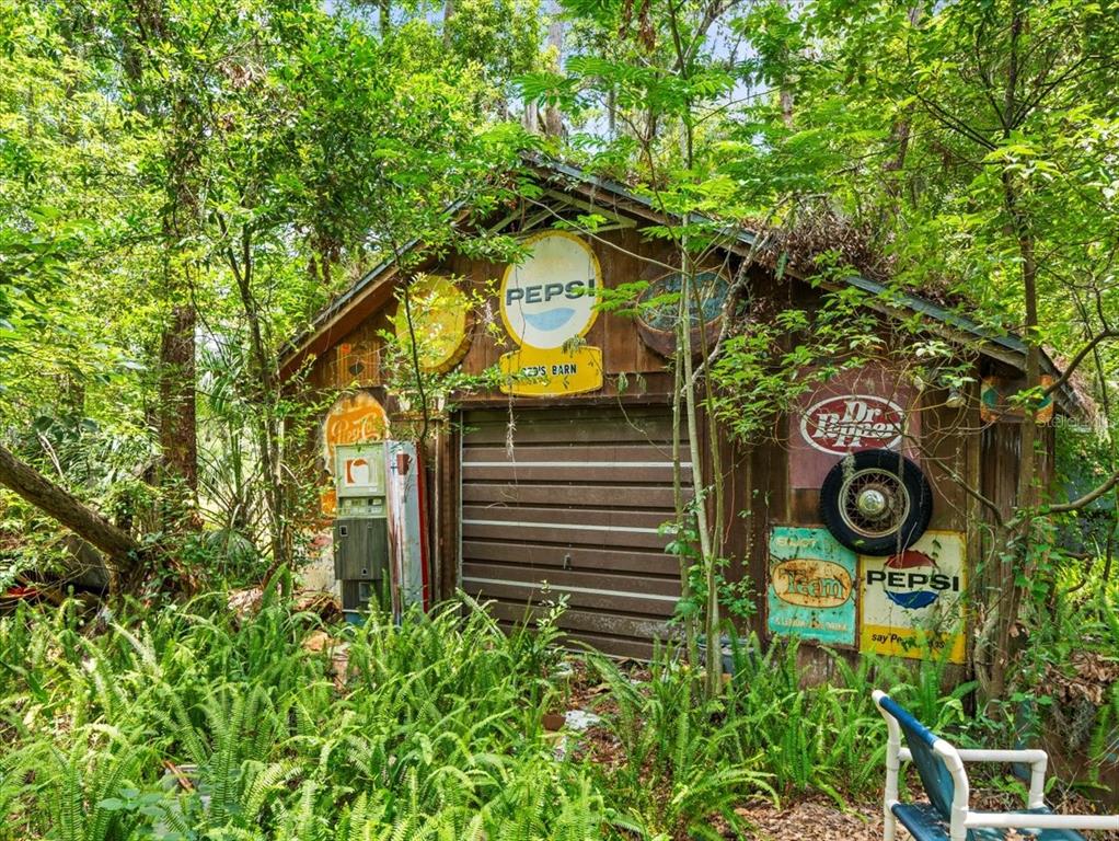 16035 Chastain Road Odessa, FL 33556 - Photo 19 of 31 a view of a wooden door and a tree