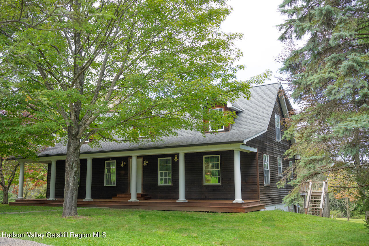 90 Highland Road Stone Ridge, NY 12484 - Photo 1 of 27 front view of a house with a yard