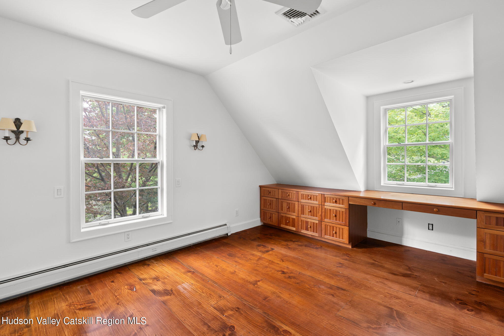 90 Highland Road Stone Ridge, NY 12484 - Photo 20 of 27 an empty room with wooden floor and windows