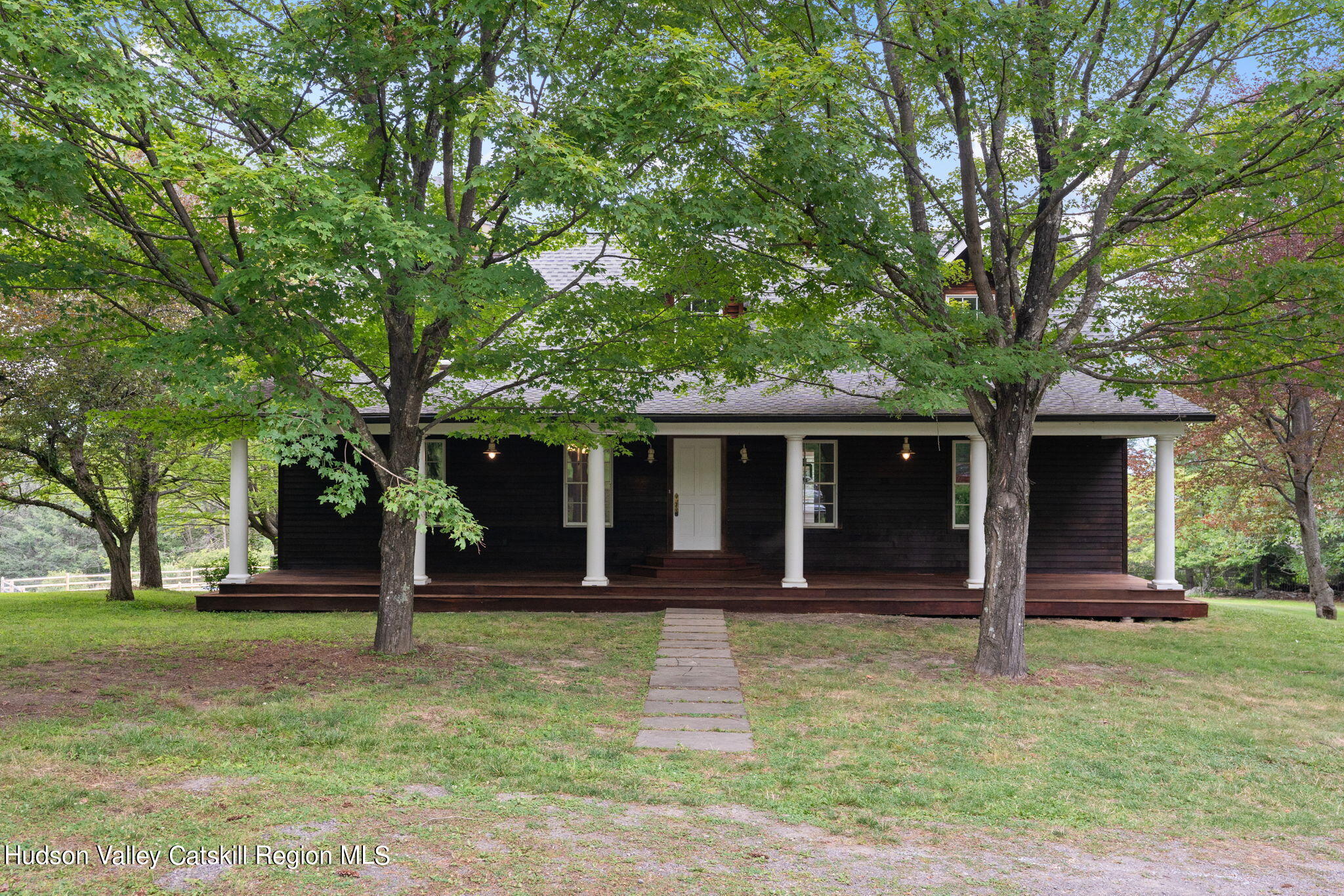 90 Highland Road Stone Ridge, NY 12484 - Photo 26 of 27 a front view of a house with garden