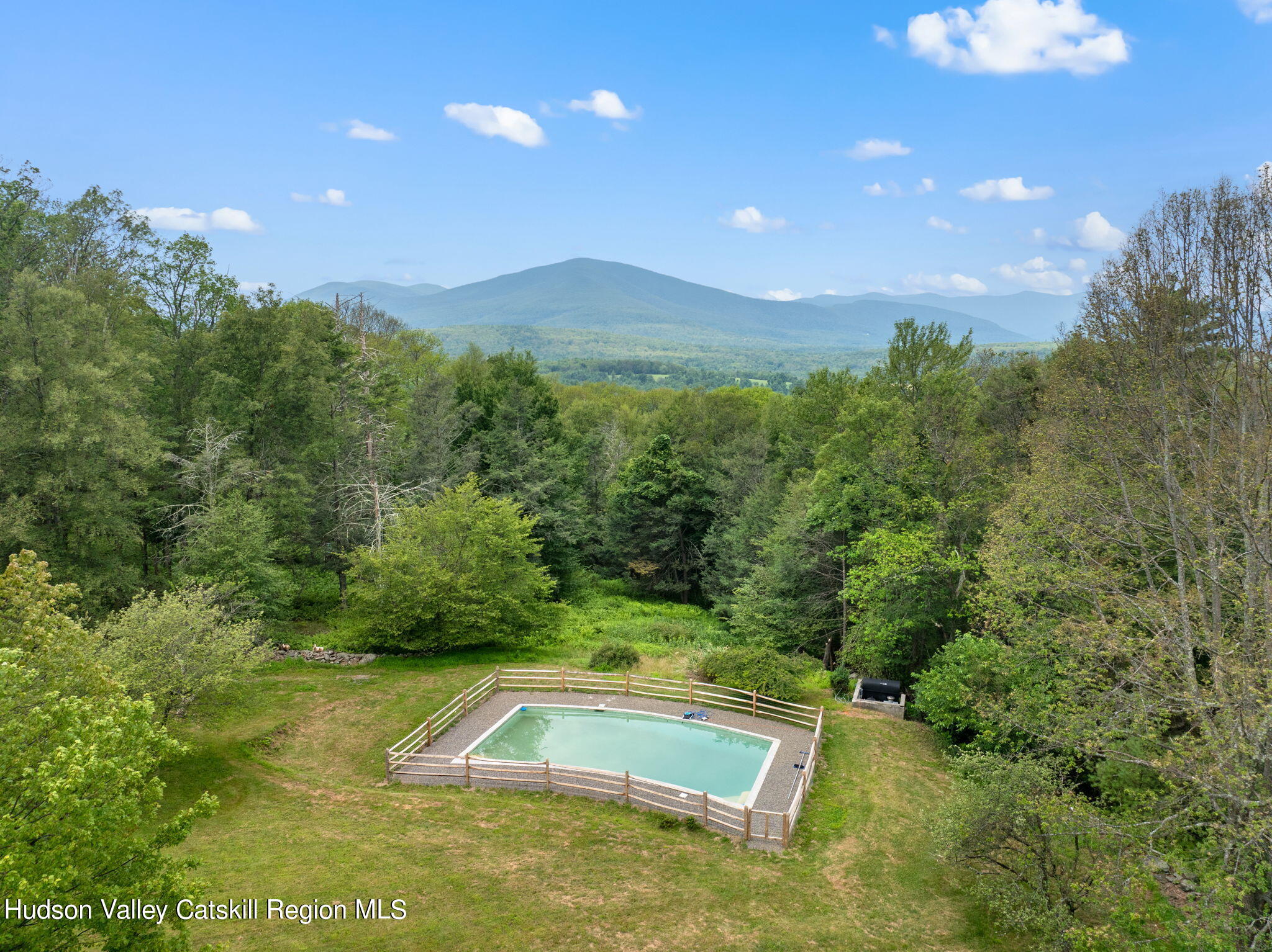 90 Highland Road Stone Ridge, NY 12484 - Photo 4 of 27 a view of a backyard with swimming pool