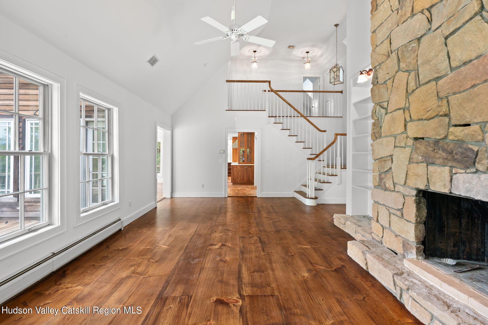 90 Highland Road Stone Ridge, NY 12484 - Photo 8 of 27 a view of empty room with wooden floor and fan