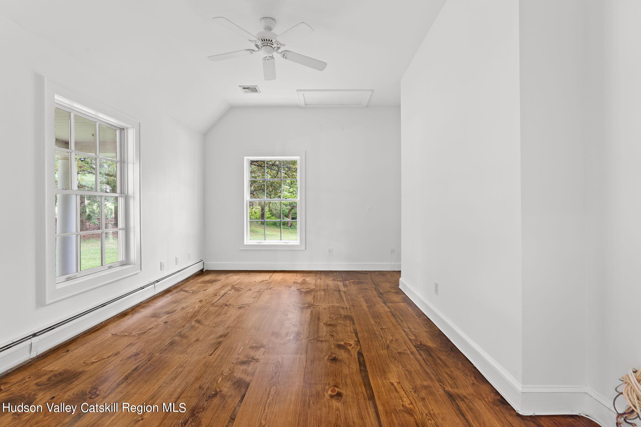 90 Highland Road Stone Ridge, NY 12484 - Photo 9 of 27 a view of an empty room with wooden floor and a window