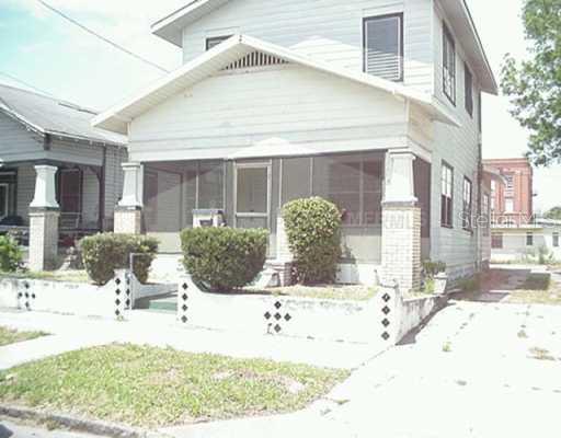 1927 West Pine Street Tampa, FL 33607 - Photo 1 of 1 a view of a house with snow on the road