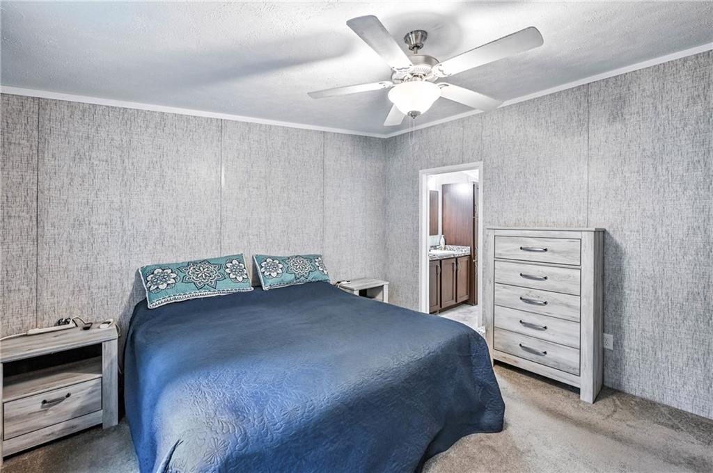 73 South Summit Road, Unit 503 Greenville, PA 16125 - Photo 20 of 36 a bedroom with a bed and a ceiling fan