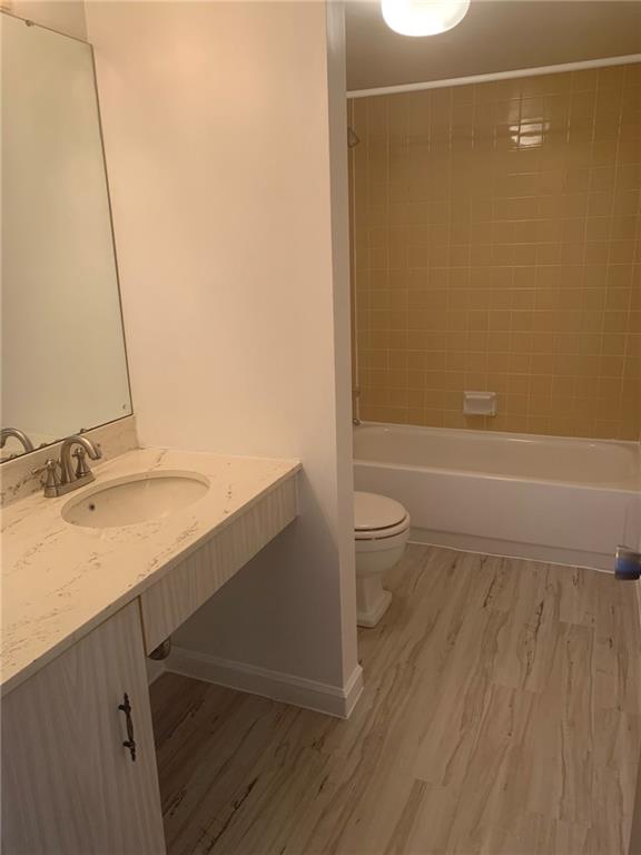 2120 Greentree Road, Unit TE11 Pittsburgh, PA 15220 - Photo 12 of 23 a bathroom with a granite countertop sink toilet and shower