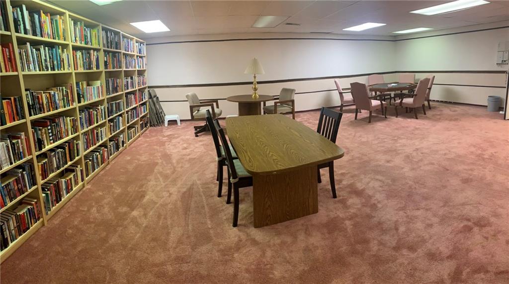 2120 Greentree Road, Unit TE11 Pittsburgh, PA 15220 - Photo 16 of 23 a dining room with furniture and a rug