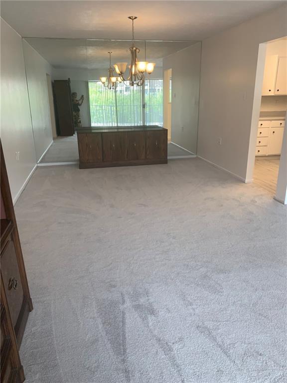 2120 Greentree Road, Unit TE11 Pittsburgh, PA 15220 - Photo 7 of 23 wooden floor in an empty room with a window