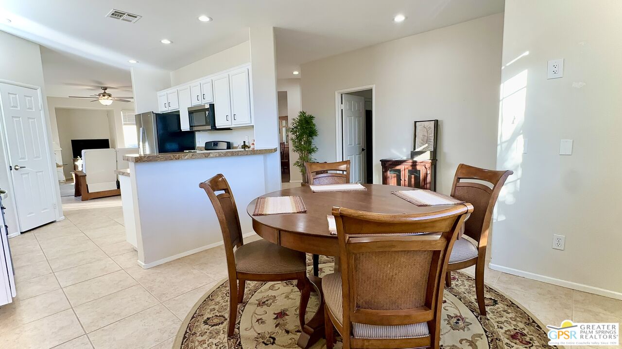 83530 Fenton Court Indio, CA 92203 - Photo 3 of 14 a view of a dining room with furniture