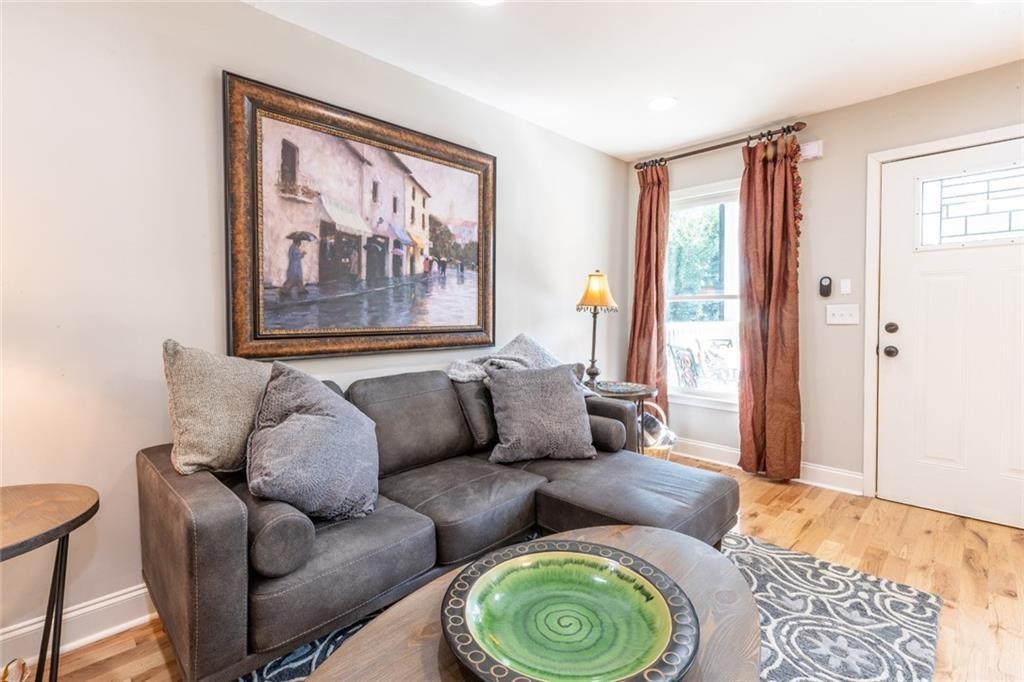 955 Coleman Street Southwest Atlanta, GA 30310 - Photo 11 of 56 a living room with furniture and a window