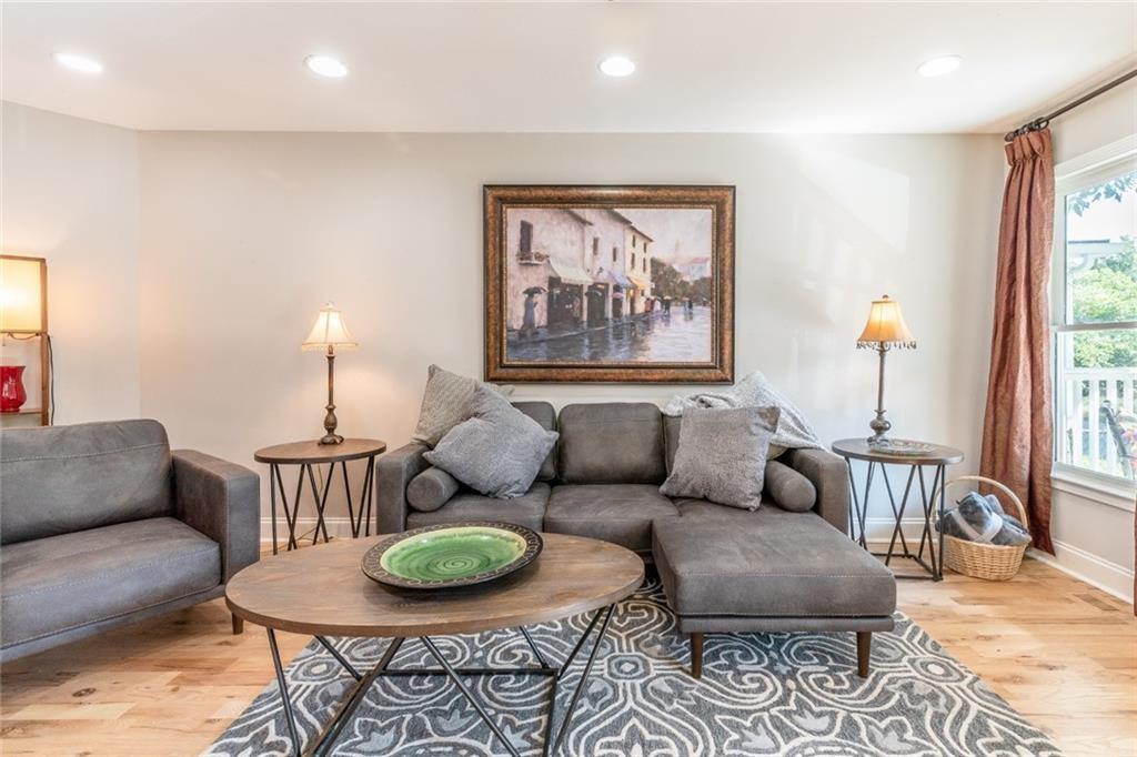 955 Coleman Street Southwest Atlanta, GA 30310 - Photo 12 of 56 a living room with furniture and a table