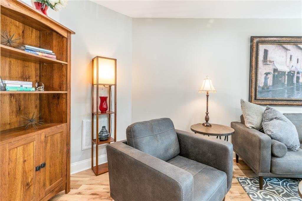 955 Coleman Street Southwest Atlanta, GA 30310 - Photo 13 of 56 a living room with furniture and a lamp