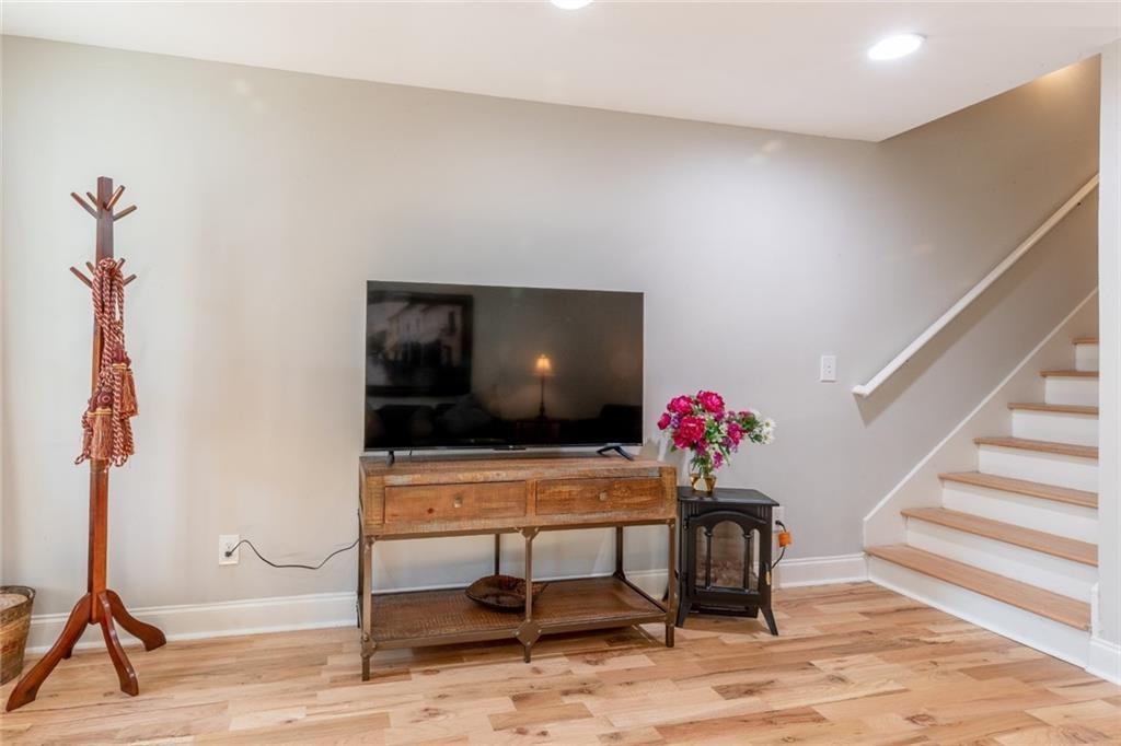 955 Coleman Street Southwest Atlanta, GA 30310 - Photo 14 of 56 a living room with furniture and a flat screen tv