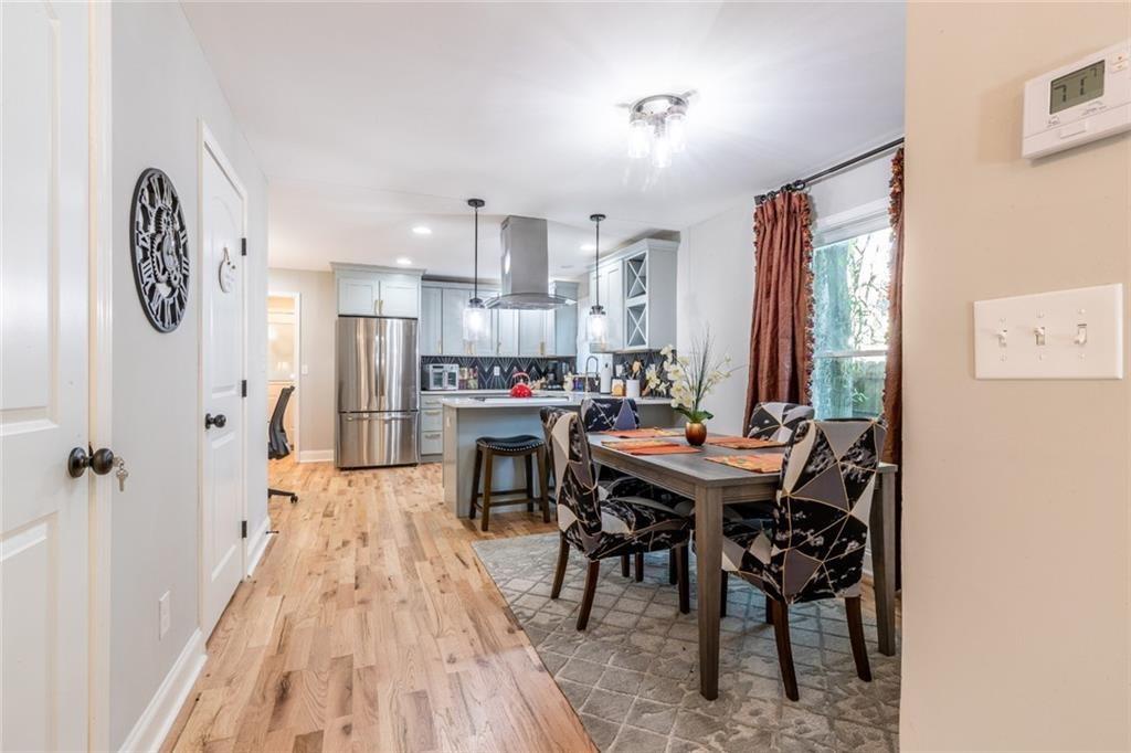 955 Coleman Street Southwest Atlanta, GA 30310 - Photo 16 of 56 a view of a dining room with furniture and window