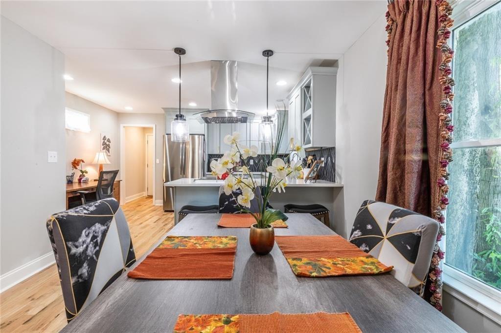 955 Coleman Street Southwest Atlanta, GA 30310 - Photo 18 of 56 a living room with furniture and a wooden floor