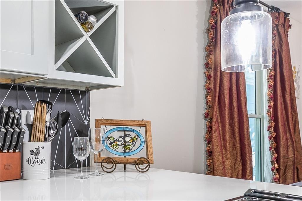 955 Coleman Street Southwest Atlanta, GA 30310 - Photo 27 of 56 a view of walk in closet with clothes and shoes
