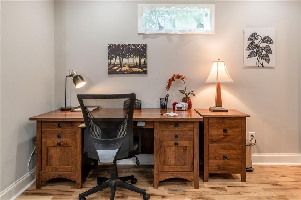 955 Coleman Street Southwest Atlanta, GA 30310 - Photo 29 of 56 a view of a workspace with furniture and a window