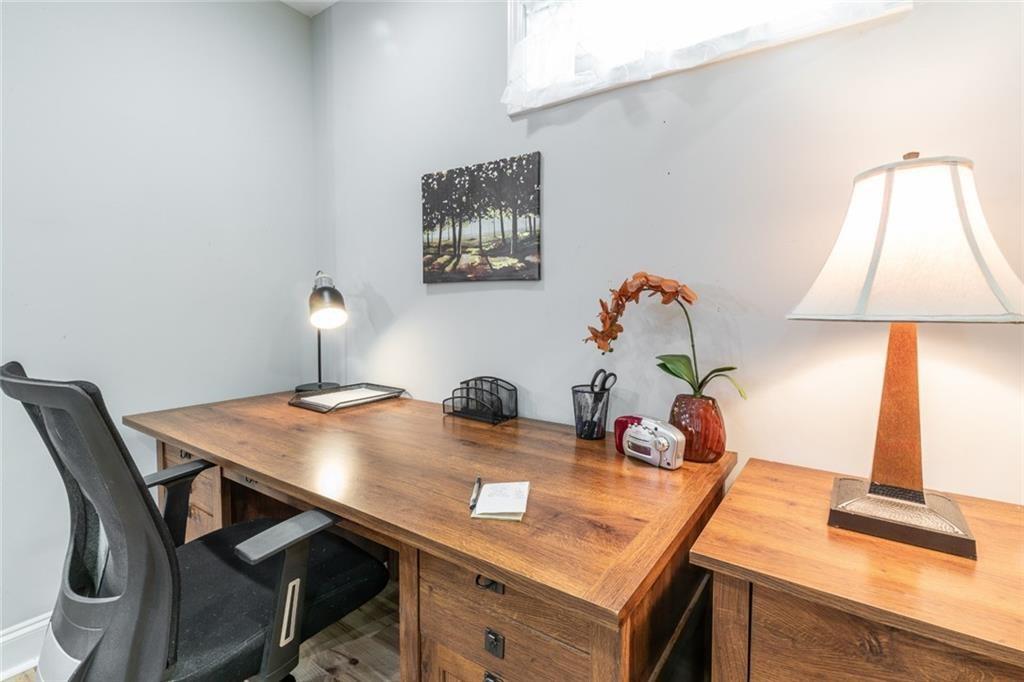 955 Coleman Street Southwest Atlanta, GA 30310 - Photo 30 of 56 a view of a dining room with a table and chairs