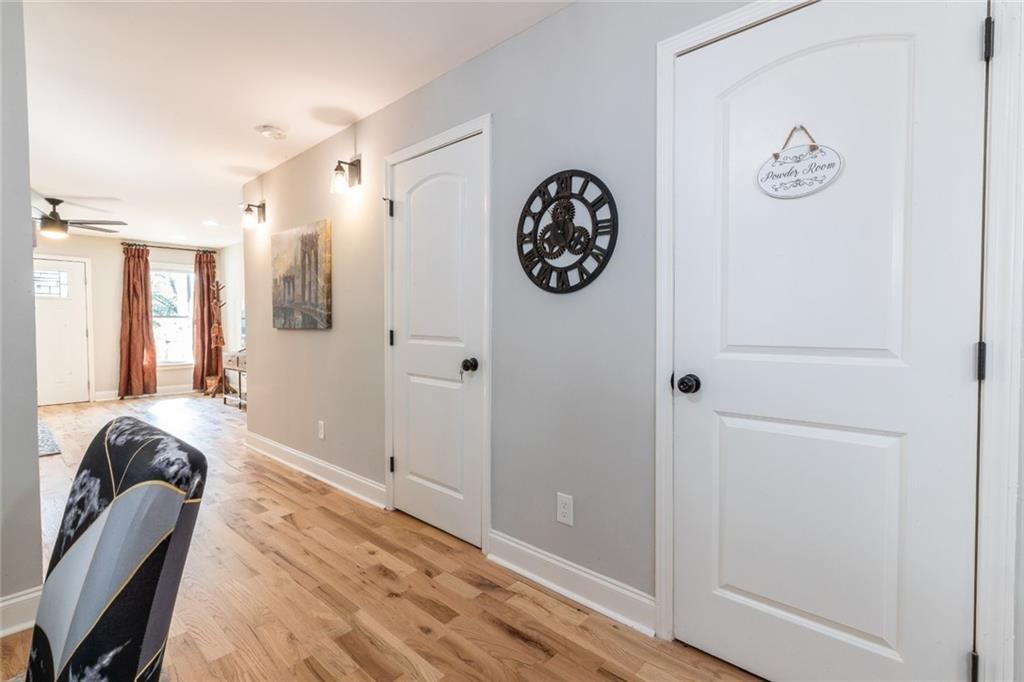 955 Coleman Street Southwest Atlanta, GA 30310 - Photo 33 of 56 a view of a hallway with entryway wooden floor and front door