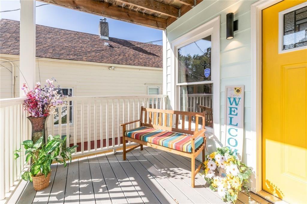 955 Coleman Street Southwest Atlanta, GA 30310 - Photo 4 of 56 a view of a balcony with wooden floor