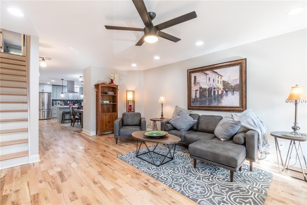 955 Coleman Street Southwest Atlanta, GA 30310 - Photo 5 of 56 a living room with furniture and a ceiling fan
