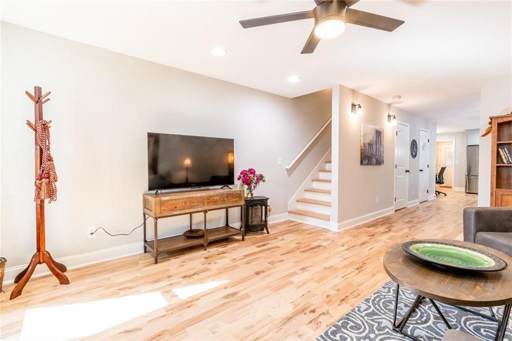 955 Coleman Street Southwest Atlanta, GA 30310 - Photo 8 of 56 a living room with furniture and a flat screen tv