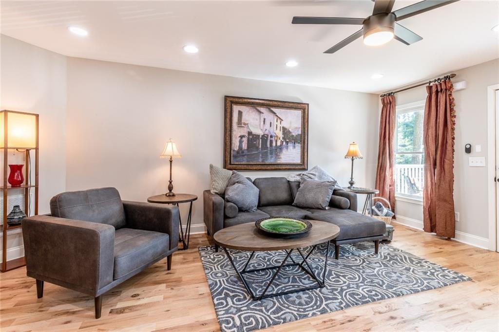 955 Coleman Street Southwest Atlanta, GA 30310 - Photo 9 of 56 a living room with furniture and a rug