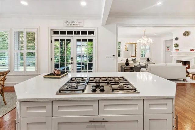 a view of a dining room with furniture and window