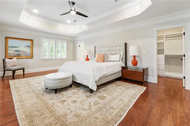 a bed room with a bed and a couch