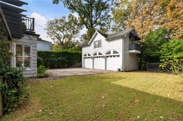 a kitchen with a sink stove and microwave