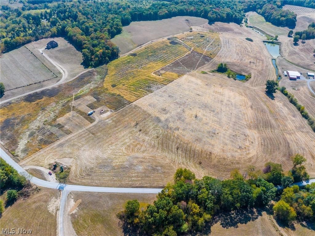 7100 Halo Road Northwest Dellroy, OH 44620 - Photo 2 of 10 Overview of rural landscape featuring abundant farmland
