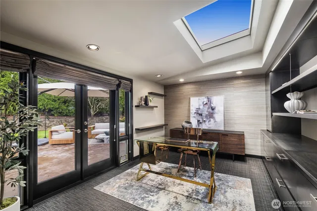 a view of a living room and a balcony