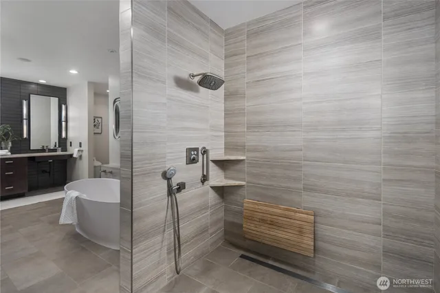 a bathroom with a double vanity sink and a mirror