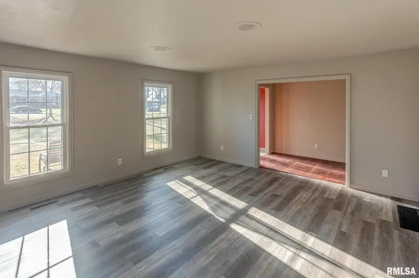 a view of an empty room and window