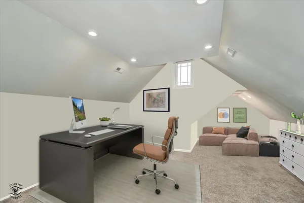 a bedroom with furniture and a window