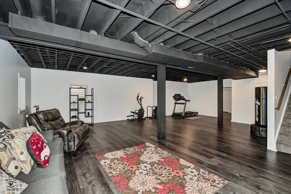 a very nice looking room with wooden floor