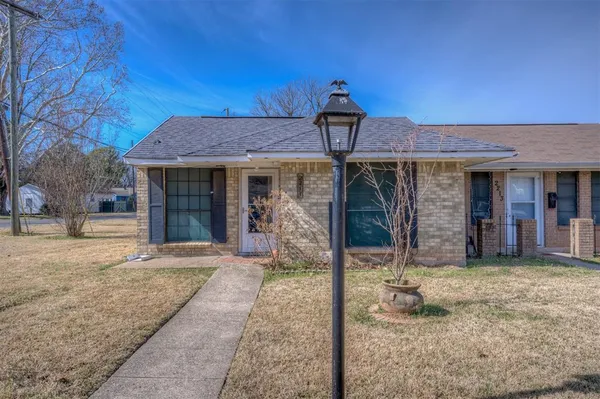 a front view of a house with a porch