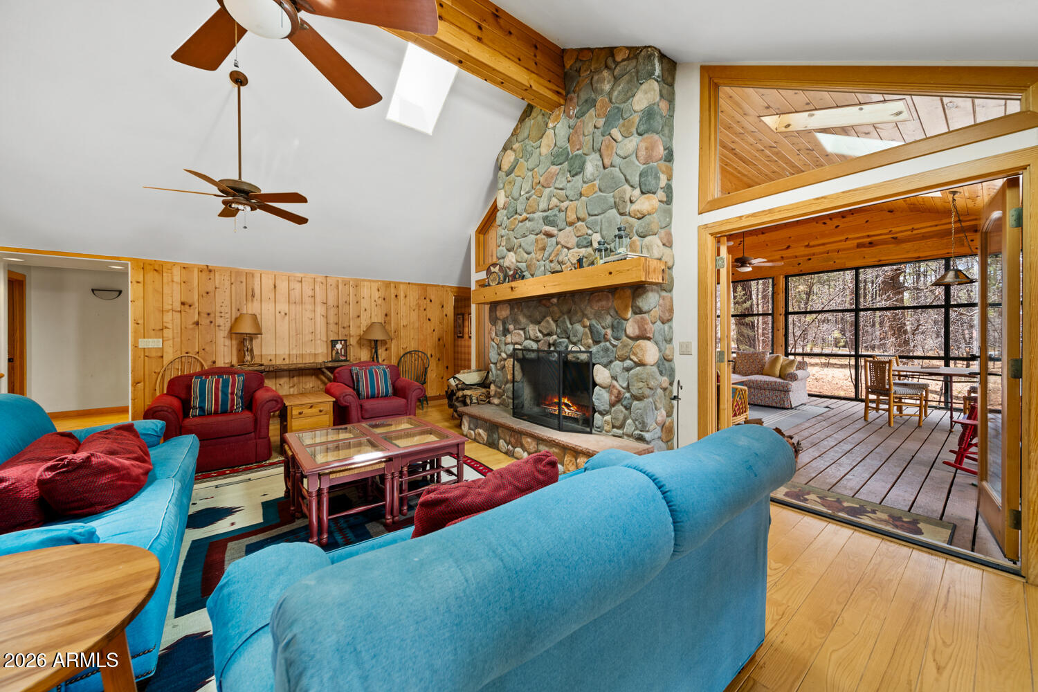 2539 Butterfly Lane Pinetop, AZ 85935 - Photo 15 of 61 a living room with furniture and a fireplace