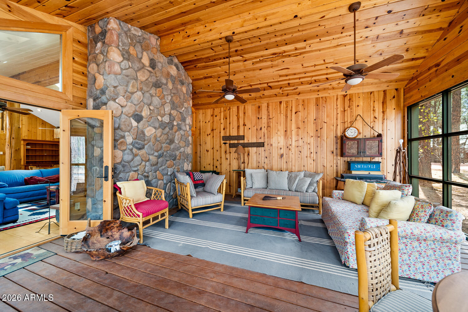 2539 Butterfly Lane Pinetop, AZ 85935 - Photo 20 of 61 a view of a livingroom with lounge chair and a couch