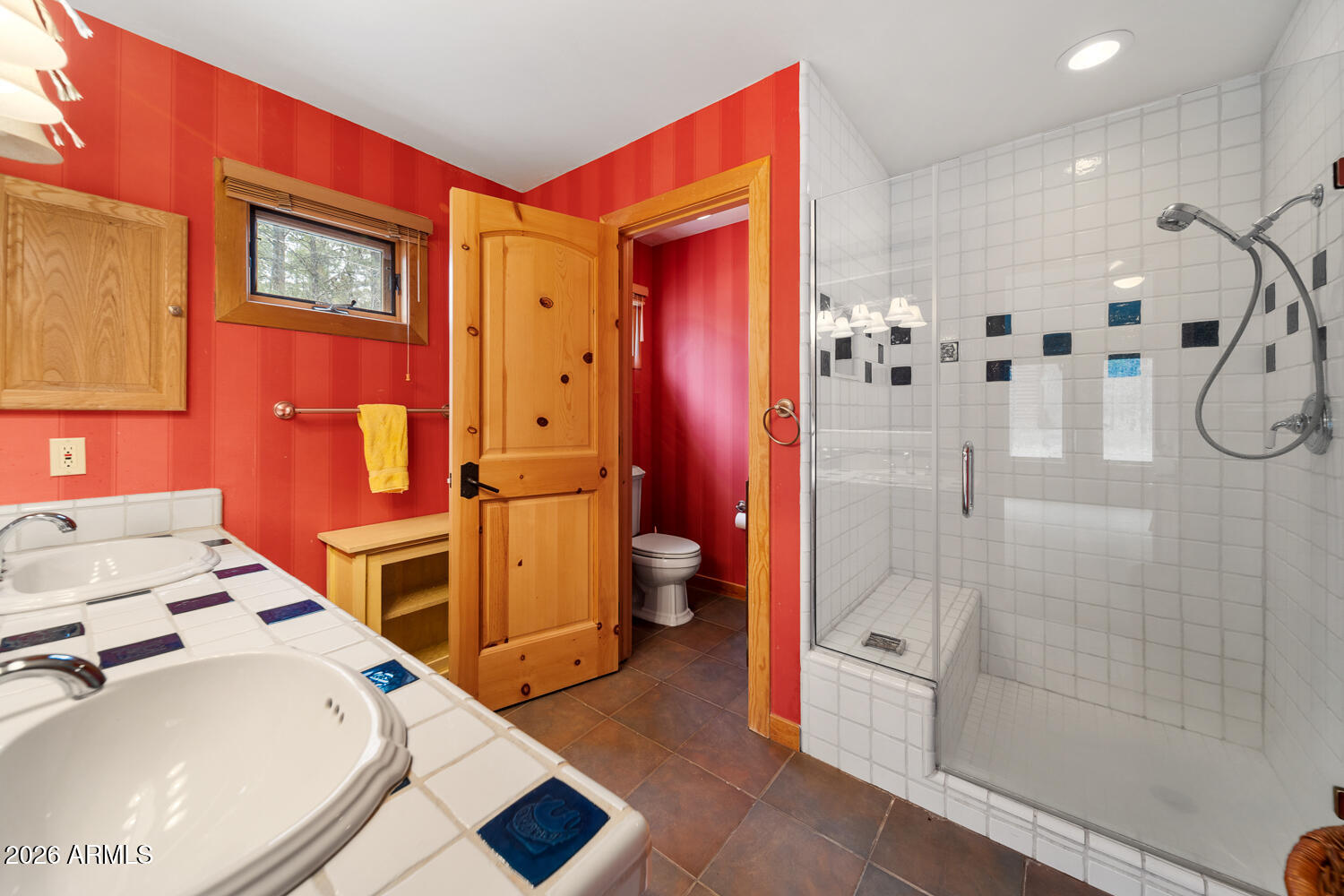 2539 Butterfly Lane Pinetop, AZ 85935 - Photo 26 of 61 a bathroom with a sink a toilet and shower