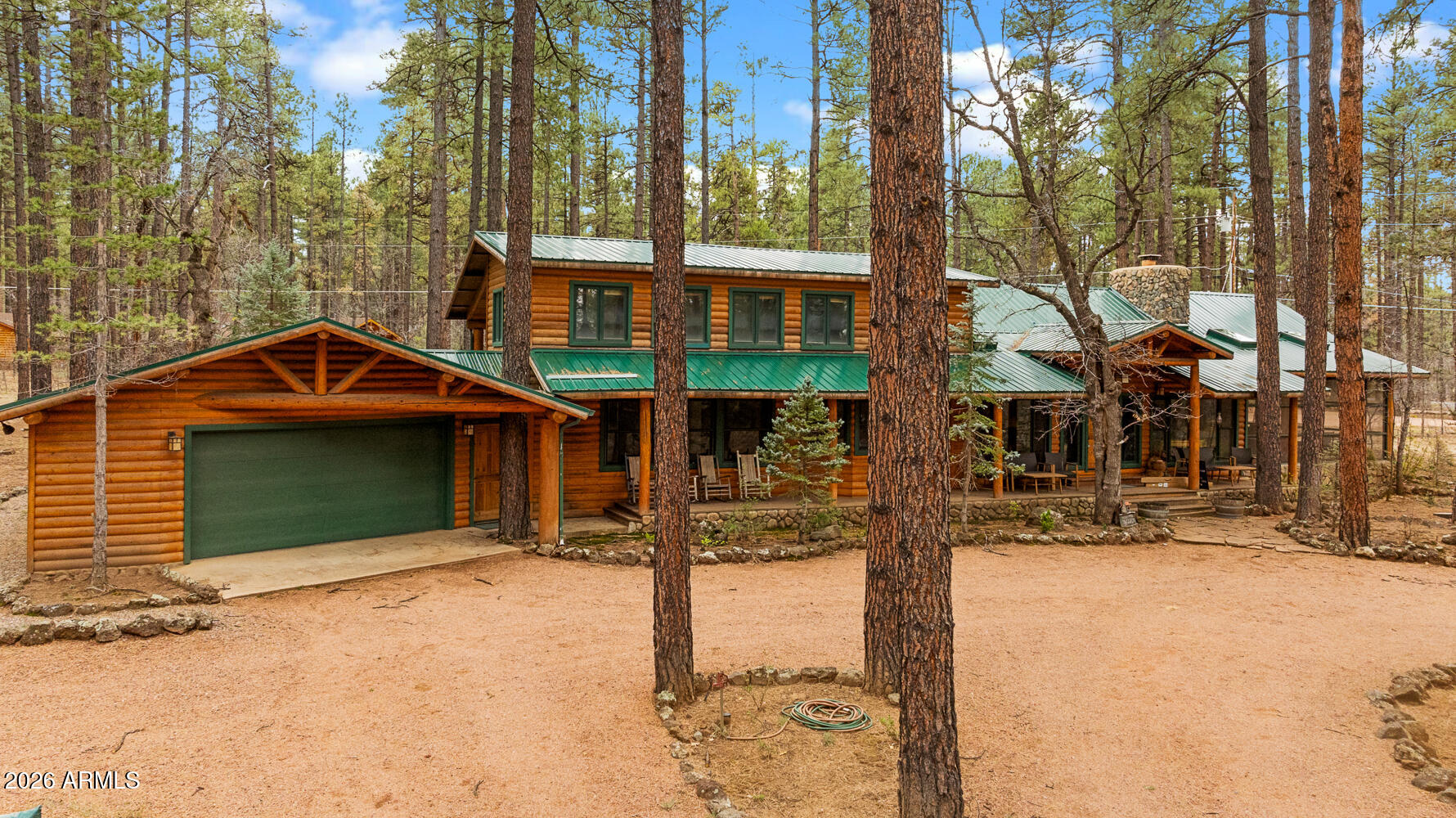 2539 Butterfly Lane Pinetop, AZ 85935 - Photo 3 of 61 a front view of a house with a yard